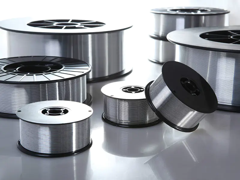 Spools of Aluminum Welding Wire ER4943 are shown, commonly used for welding 1xxx, 3xxx, 6xxx, and cast aluminum alloys with stable feed and consistent performance.